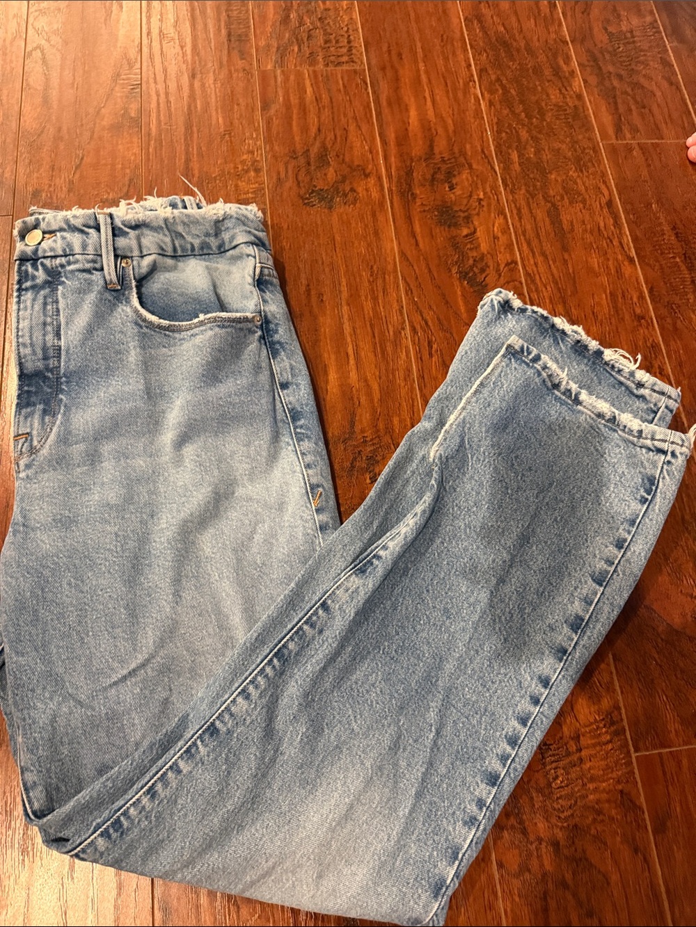 Good American Light Blue Straight Leg Jeans with Frayed Hem